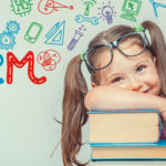 STEM word and symbols over beautiful cute little girl with books. modern education concept
